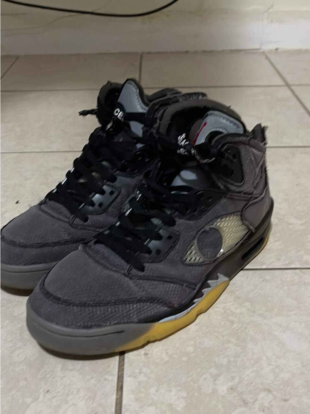 Jordan Men's Dark Gray and Black High-Top Sneakers with Yellow Accents